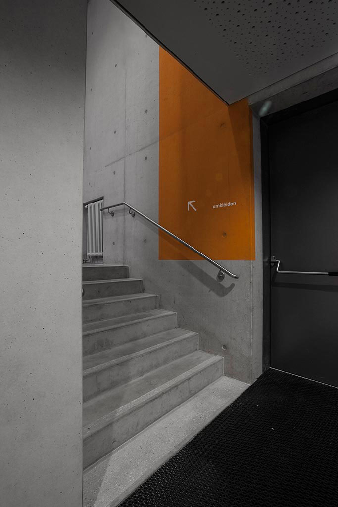 orientation system concrete orange swatches staircase corridor gym multipurpose hall information